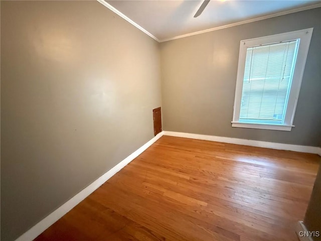 211 Pharis St, Syracuse, NY 13204 - empty room with ornamental molding, a ceiling fan, and wood finished floors