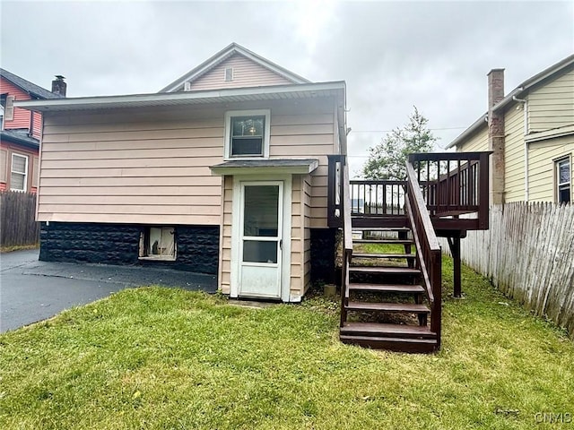 211 Pharis St, Syracuse, NY 13204 - rear view of property with a deck and stairway