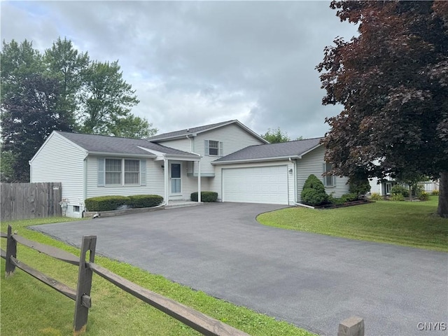 8467 Torchwood Ln, Cicero, NY 13039 - split level home with driveway and an attached garage