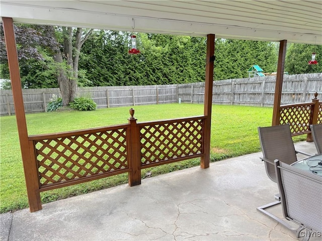 8467 Torchwood Ln, Cicero, NY 13039 - fenced backyard with a patio area