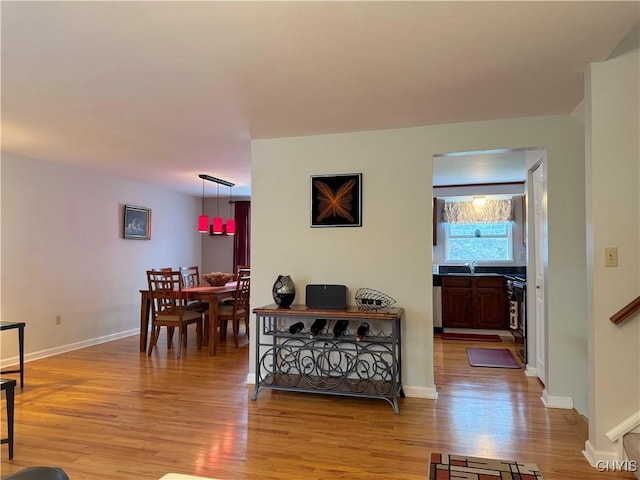 8467 Torchwood Ln, Cicero, NY 13039 - living room with light wood finished floors and baseboards