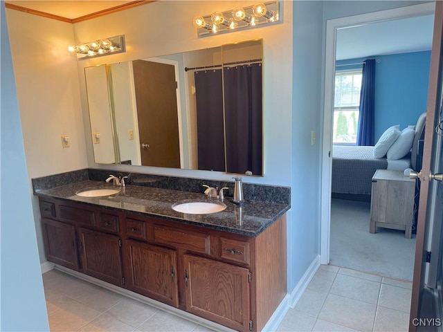 8467 Torchwood Ln, Cicero, NY 13039 - full bath with tile patterned flooring, double vanity, and ensuite bathroom