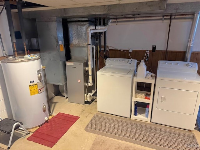 8467 Torchwood Ln, Cicero, NY 13039 - laundry room featuring water heater and independent washer and dryer