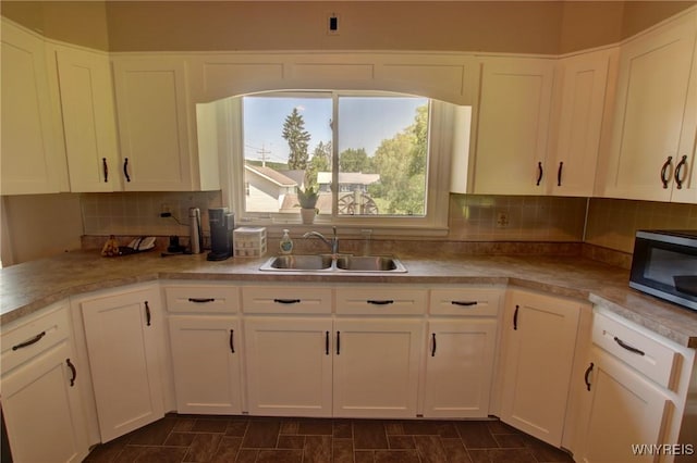 6716 Main St, Cherry Creek, NY 14723 - kitchen with stainless steel microwave and white cabinetry