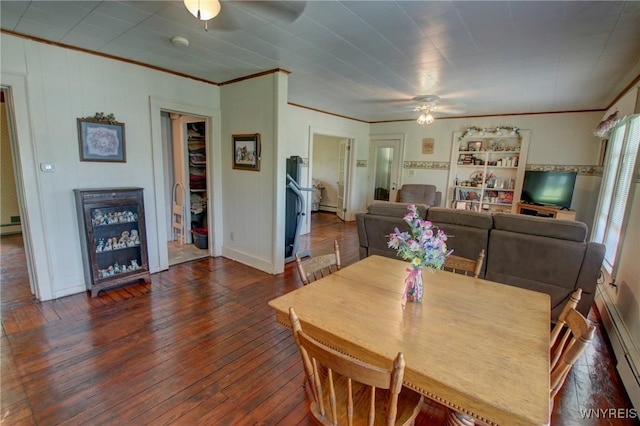 6716 Main St, Cherry Creek, NY 14723 - dining area featuring ceiling fan, ornamental molding, hardwood / wood-style floors, and a baseboard radiator