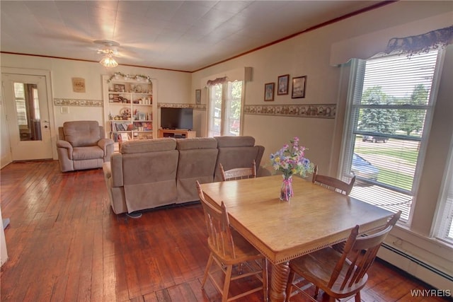 6716 Main St, Cherry Creek, NY 14723 - dining room featuring a baseboard radiator, dark wood-style floors, ornamental molding, and ceiling fan