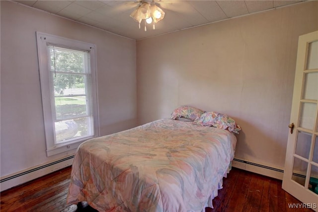 6716 Main St, Cherry Creek, NY 14723 - bedroom featuring baseboard heating and hardwood / wood-style floors