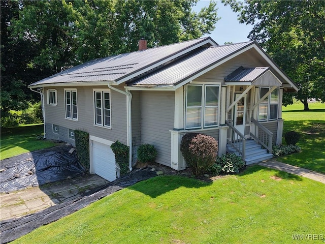 6716 Main St, Cherry Creek, NY 14723 - view of front of property with an attached garage, a front yard, a metal roof, and asphalt driveway