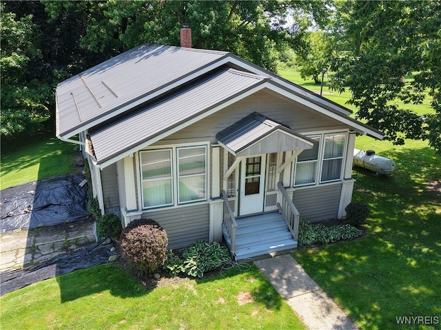 6716 Main St, Cherry Creek, NY 14723 - view of front facade featuring a front lawn and a chimney