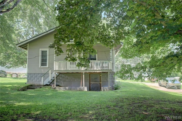 6716 Main St, Cherry Creek, NY 14723 - back of house with a lawn, stairway, and a wooden deck