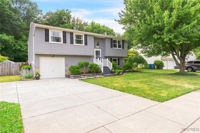 7052 Waring Cir, Evans, NY 14047 - raised ranch with concrete driveway and a garage