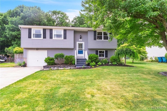 7052 Waring Cir, Evans, NY 14047 - split foyer home featuring concrete driveway, a front lawn, and an attached garage