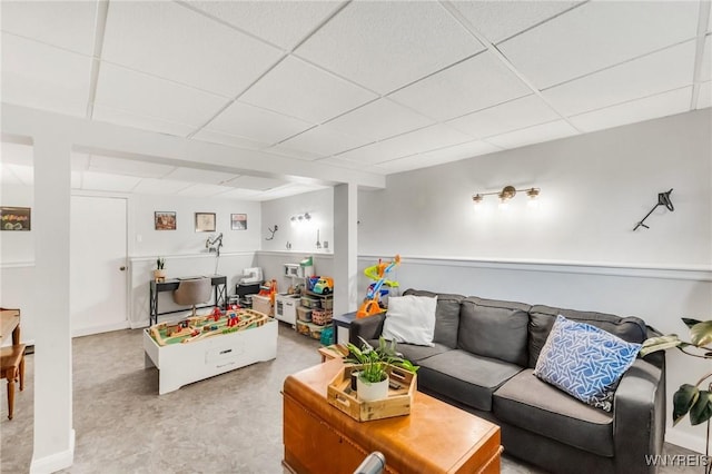 7052 Waring Cir, Evans, NY 14047 - living room featuring a drop ceiling and baseboards