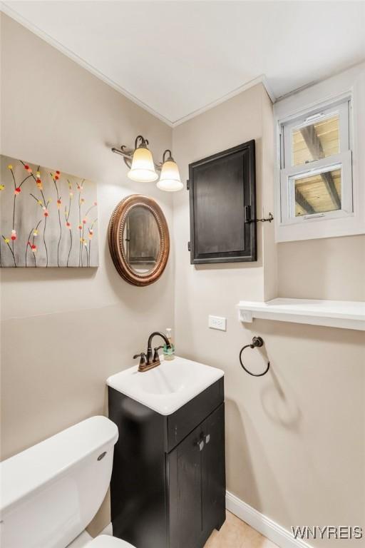 7052 Waring Cir, Evans, NY 14047 - bathroom featuring toilet and vanity