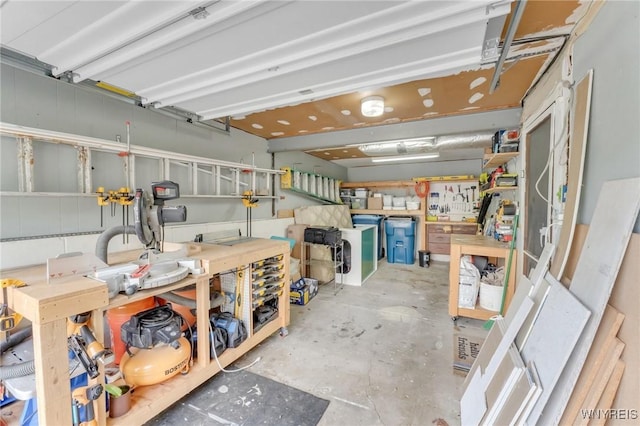 7052 Waring Cir, Evans, NY 14047 - garage featuring a workshop area