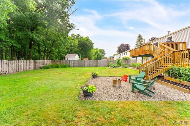 7052 Waring Cir, Evans, NY 14047 - fenced backyard with a deck and stairway