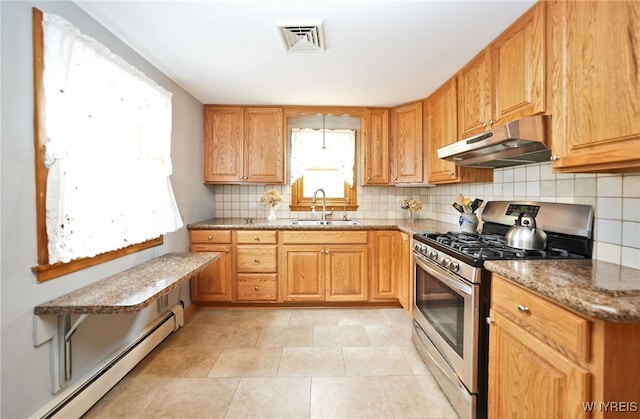 3461 Orchard Park Rd, Orchard Park, NY 14127 - kitchen featuring under cabinet range hood, stainless steel gas stove, a baseboard heating unit, backsplash, and stone counters