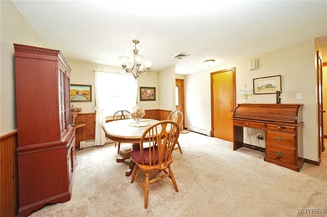 3461 Orchard Park Rd, Orchard Park, NY 14127 - dining area featuring a wainscoted wall, a chandelier, light colored carpet, a baseboard radiator, and wooden walls