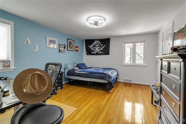 66 Devonshire Rd, Tonawanda, NY 14223 - bedroom with light wood-style floors and baseboards