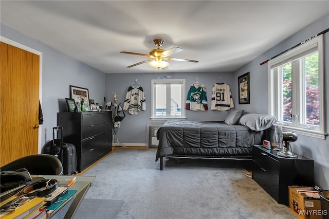 66 Devonshire Rd, Tonawanda, NY 14223 - carpeted bedroom featuring multiple windows and a ceiling fan