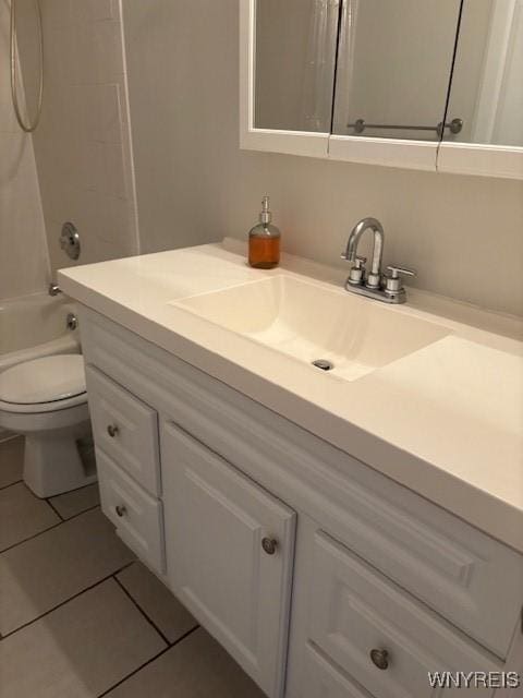 770 W Ferry St Unit 9A, Buffalo, NY 14222 - full bath with vanity, tile patterned flooring, and washtub / shower combination
