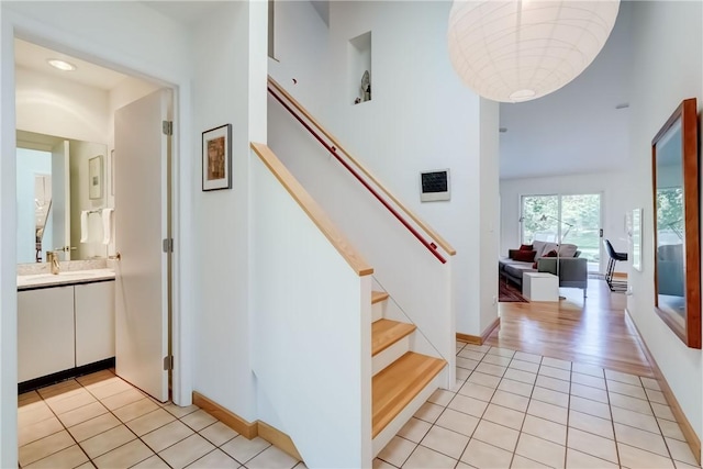 56 Waterview Cir, Penfield, NY 14625 - stairs featuring tile patterned floors and baseboards