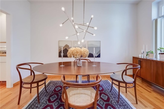 56 Waterview Cir, Penfield, NY 14625 - dining room with a chandelier and light wood-style floors