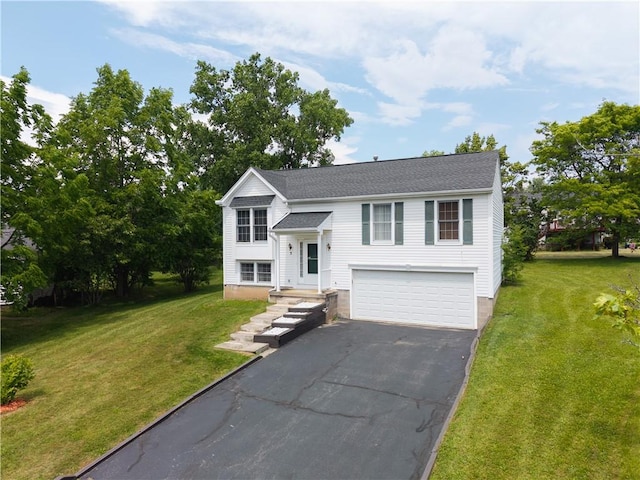 5 Yankee Ct, Chili, NY 14624 - raised ranch with asphalt driveway, an attached garage, and a front lawn