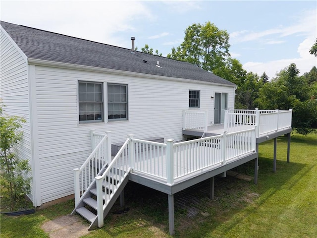 5 Yankee Ct, Chili, NY 14624 - rear view of house with a shingled roof, a yard, and a wooden deck