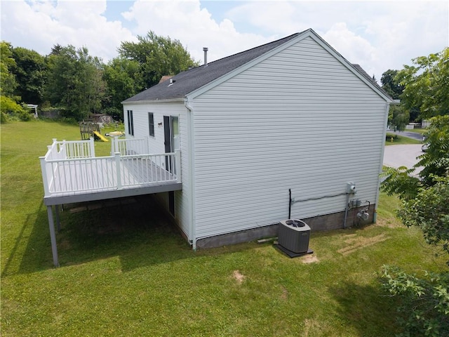 5 Yankee Ct, Chili, NY 14624 - view of home's exterior featuring a wooden deck and a yard