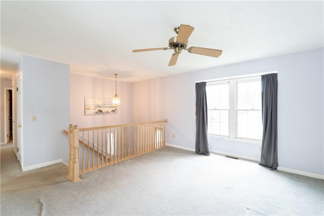 5 Yankee Ct, Chili, NY 14624 - carpeted empty room with baseboards and a ceiling fan