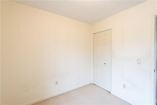 5 Yankee Ct, Chili, NY 14624 - unfurnished room with light carpet and a textured ceiling