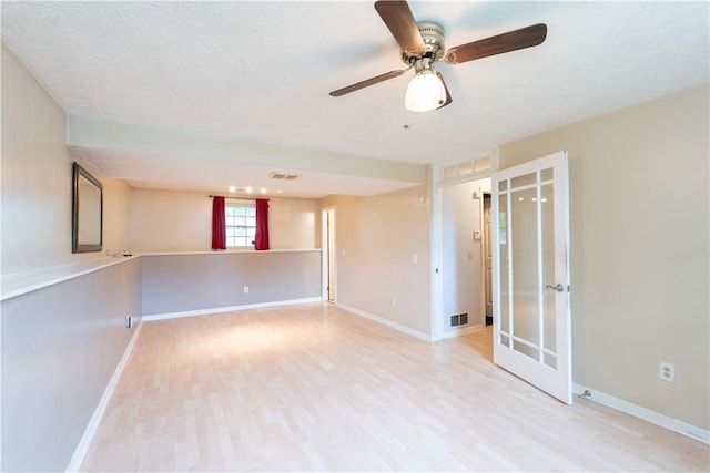 5 Yankee Ct, Chili, NY 14624 - unfurnished room with light wood finished floors, a ceiling fan, and a textured ceiling