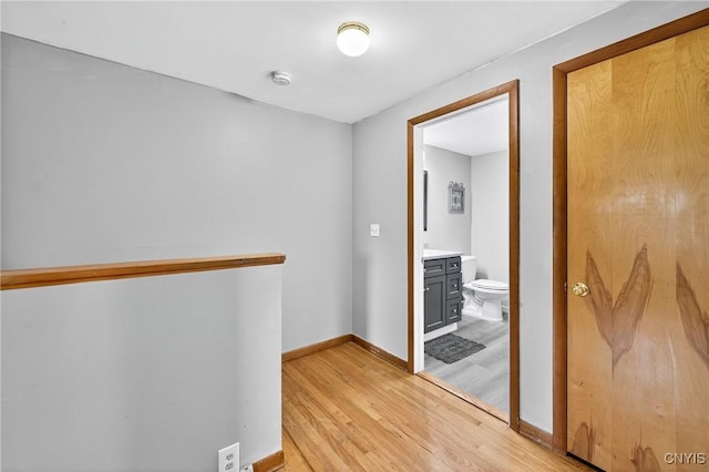 5647 Stevens Dr S, Cicero, NY 13039 - corridor with light wood-style flooring and baseboards