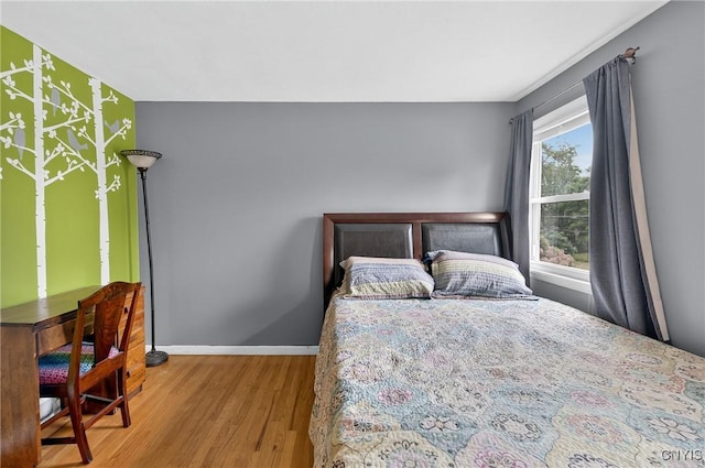 5647 Stevens Dr S, Cicero, NY 13039 - bedroom with wood finished floors and baseboards