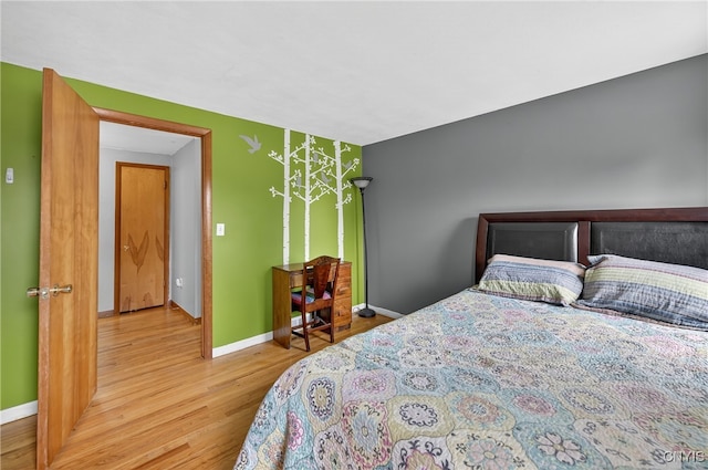 5647 Stevens Dr S, Cicero, NY 13039 - bedroom featuring wood finished floors and baseboards