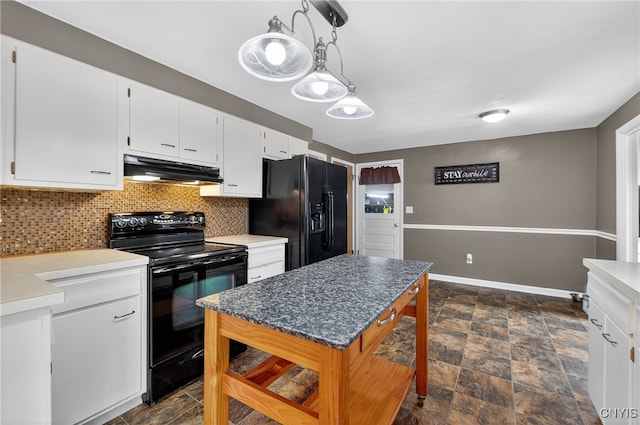 5647 Stevens Dr S, Cicero, NY 13039 - kitchen with black appliances, under cabinet range hood, backsplash, white cabinetry, and stone finish flooring