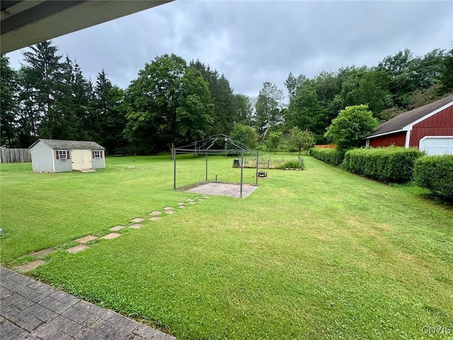 16 Locust Ave, Cortland, NY 13045 - view of yard with a shed and a garage