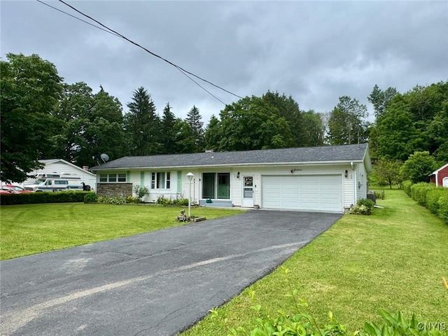 16 Locust Ave, Cortland, NY 13045 - ranch-style home with an attached garage, asphalt driveway, and a front lawn