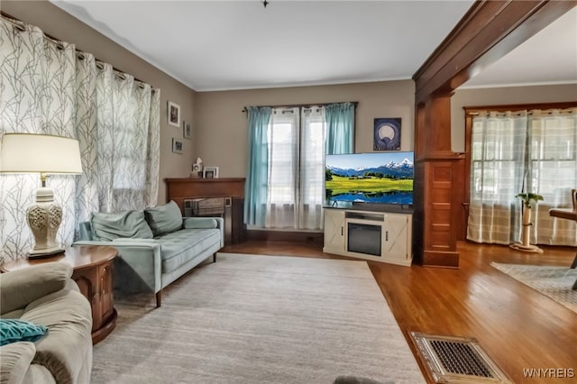 6467 Patchin Rd, Boston, NY 14025 - living area featuring crown molding and wood finished floors