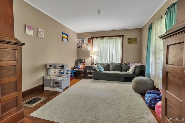 6467 Patchin Rd, Boston, NY 14025 - living area with dark wood finished floors and crown molding