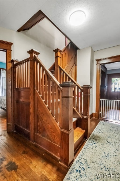 6467 Patchin Rd, Boston, NY 14025 - stairs with wood-type flooring