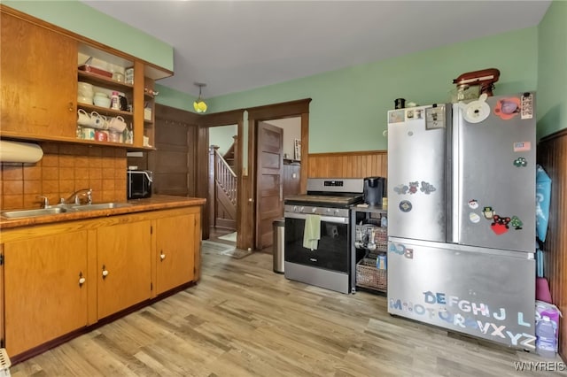 6467 Patchin Rd, Boston, NY 14025 - kitchen with stainless steel appliances, light wood finished floors, tasteful backsplash, and open shelves