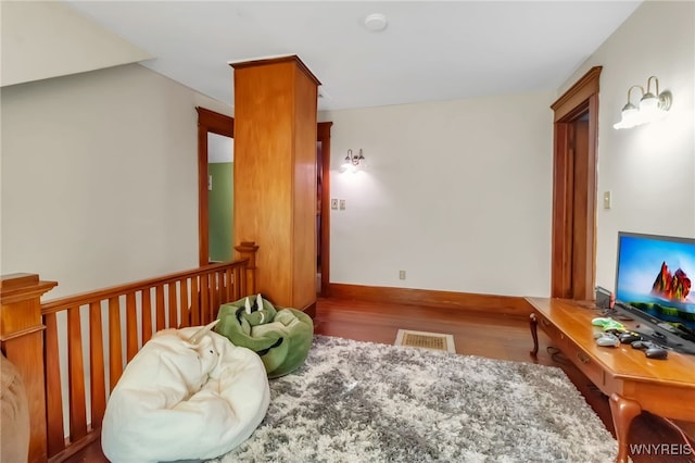 6467 Patchin Rd, Boston, NY 14025 - sitting room with wood finished floors and baseboards