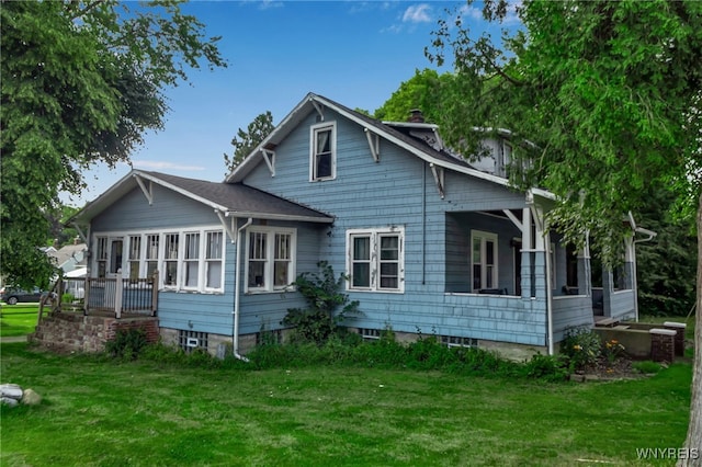 6467 Patchin Rd, Boston, NY 14025 - back of property with a yard, a sunroom, and a chimney