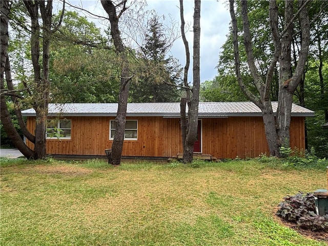 1237 County Highway 11, Davenport, NY 13860 - view of property exterior with a metal roof and a yard