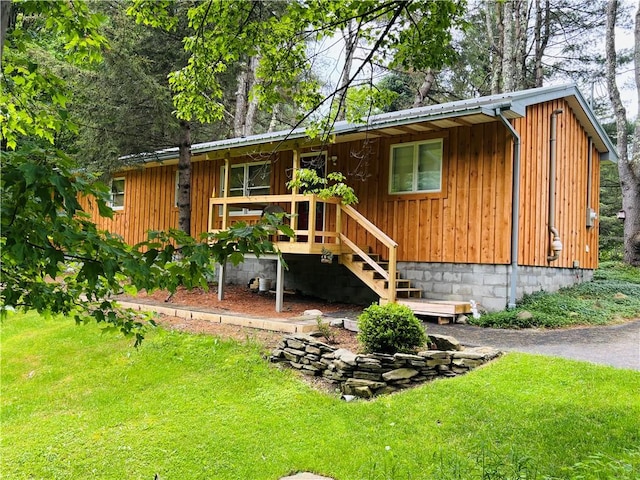 1237 County Highway 11, Davenport, NY 13860 - view of front facade featuring a front lawn and board and batten siding