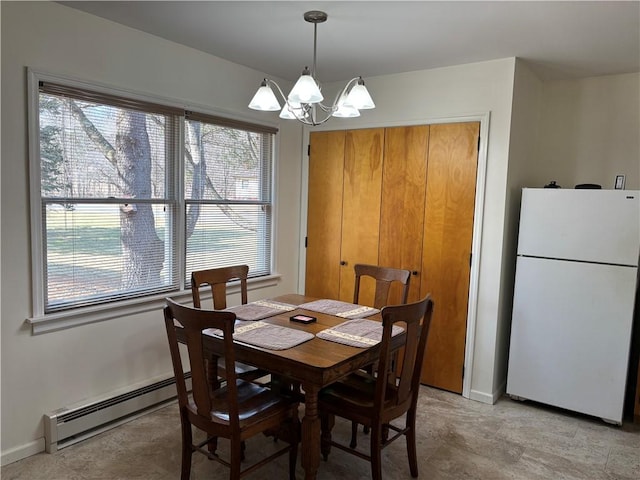 1237 County Highway 11, Davenport, NY 13860 - dining room with baseboard heating, a chandelier, and plenty of natural light