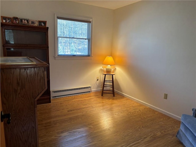 1237 County Highway 11, Davenport, NY 13860 - sitting room with a baseboard radiator and wood finished floors