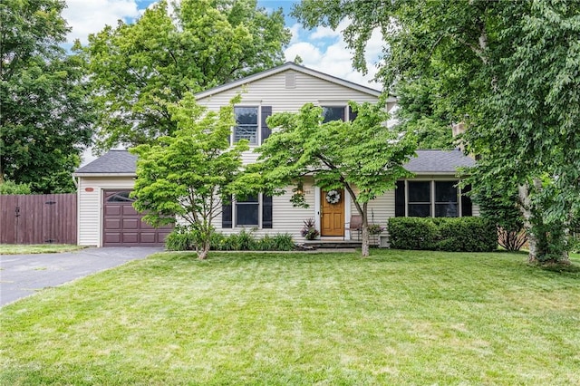 25 Killdeer Ln, Perinton, NY 14450 - view of front facade with driveway and a garage